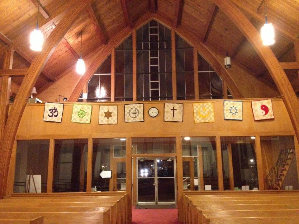 Rear of Sanctuary with symbols of world religions